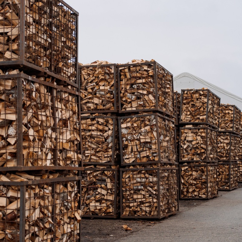 Crate-stacked premium kiln-dried hardwood at the Comfort Wood Fuels yard